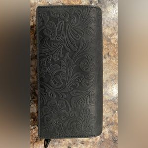 Tooled black leather wallet